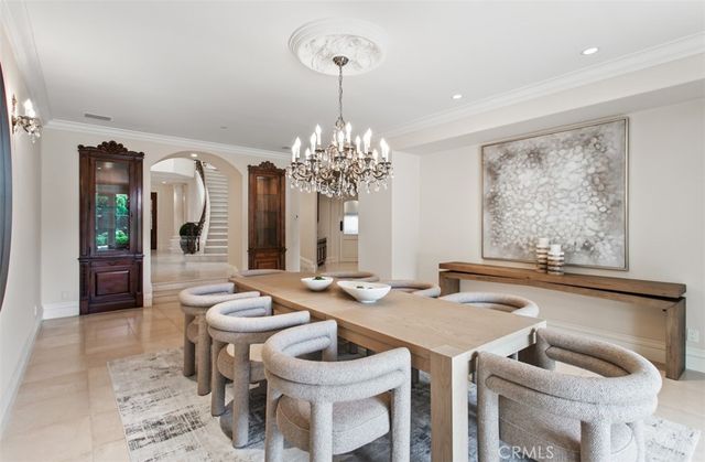 a view of a kitchen with furniture and staircase