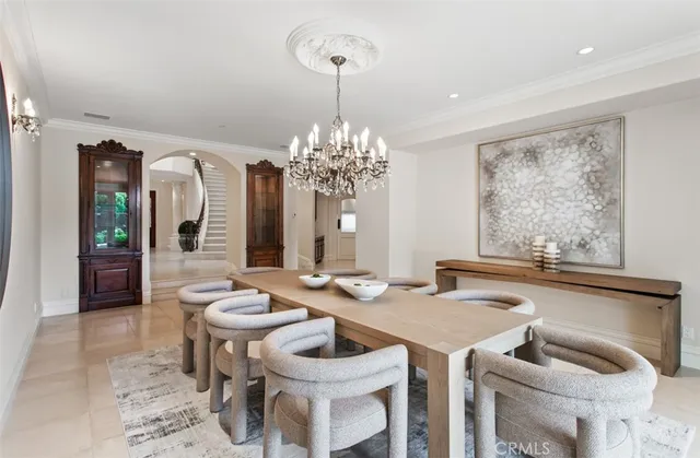 a view of a kitchen with furniture and staircase