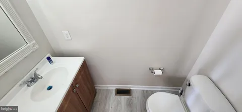 a bathroom with a sink and toilet