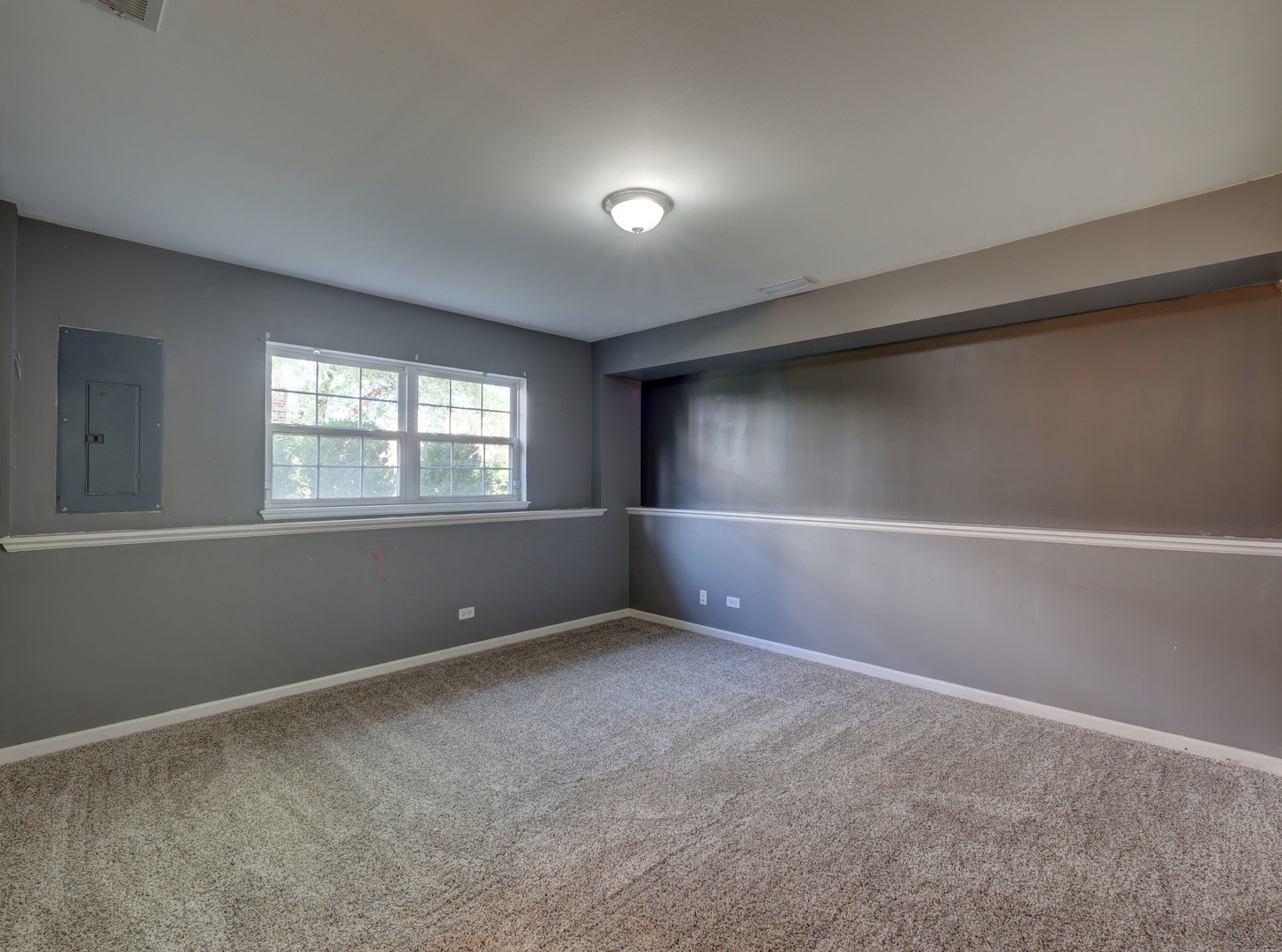 469 George Street Wood Dale, IL 60191 - Photo 21 of 24 a view of an empty room with a window