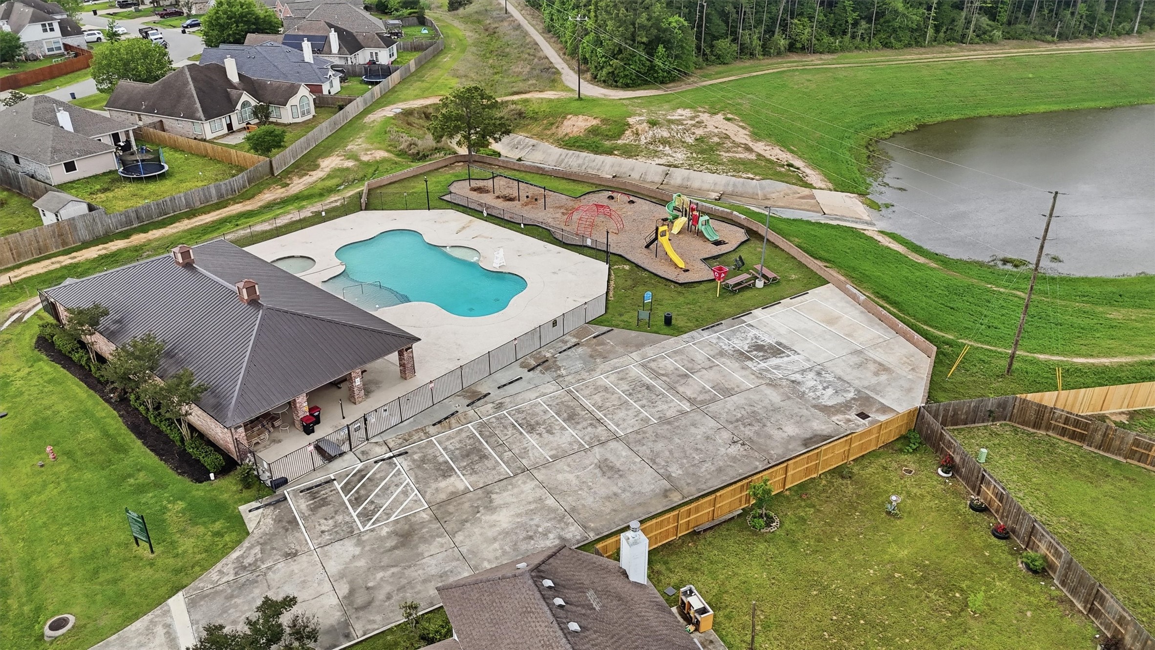 21543 Forest Colony Drive Porter, TX 77365 - Photo 5 of 32 Pool, park, and pond.