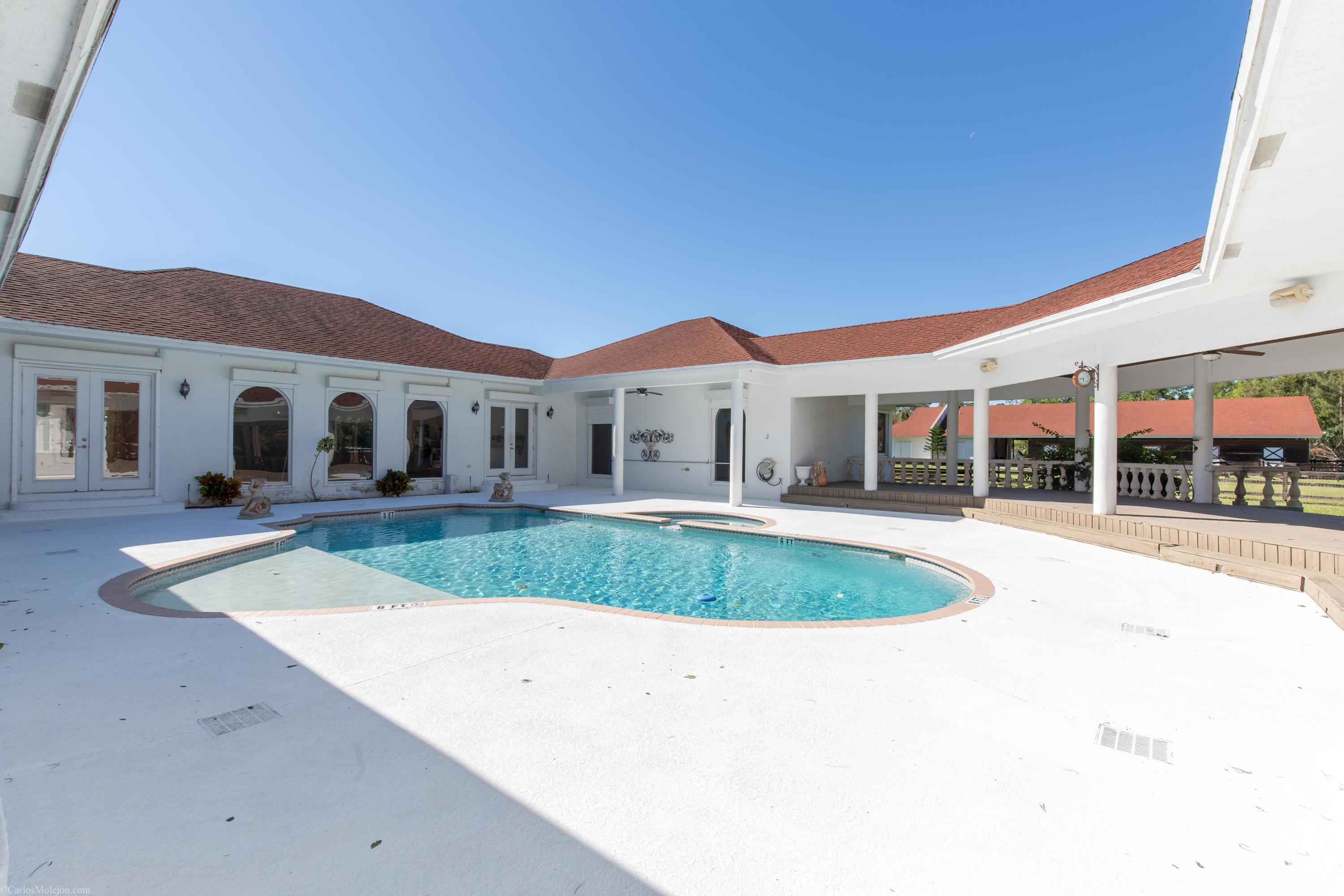 12981 Casey Road Loxahatchee, FL 33470 - Photo 65 of 86 Courtyard Pool