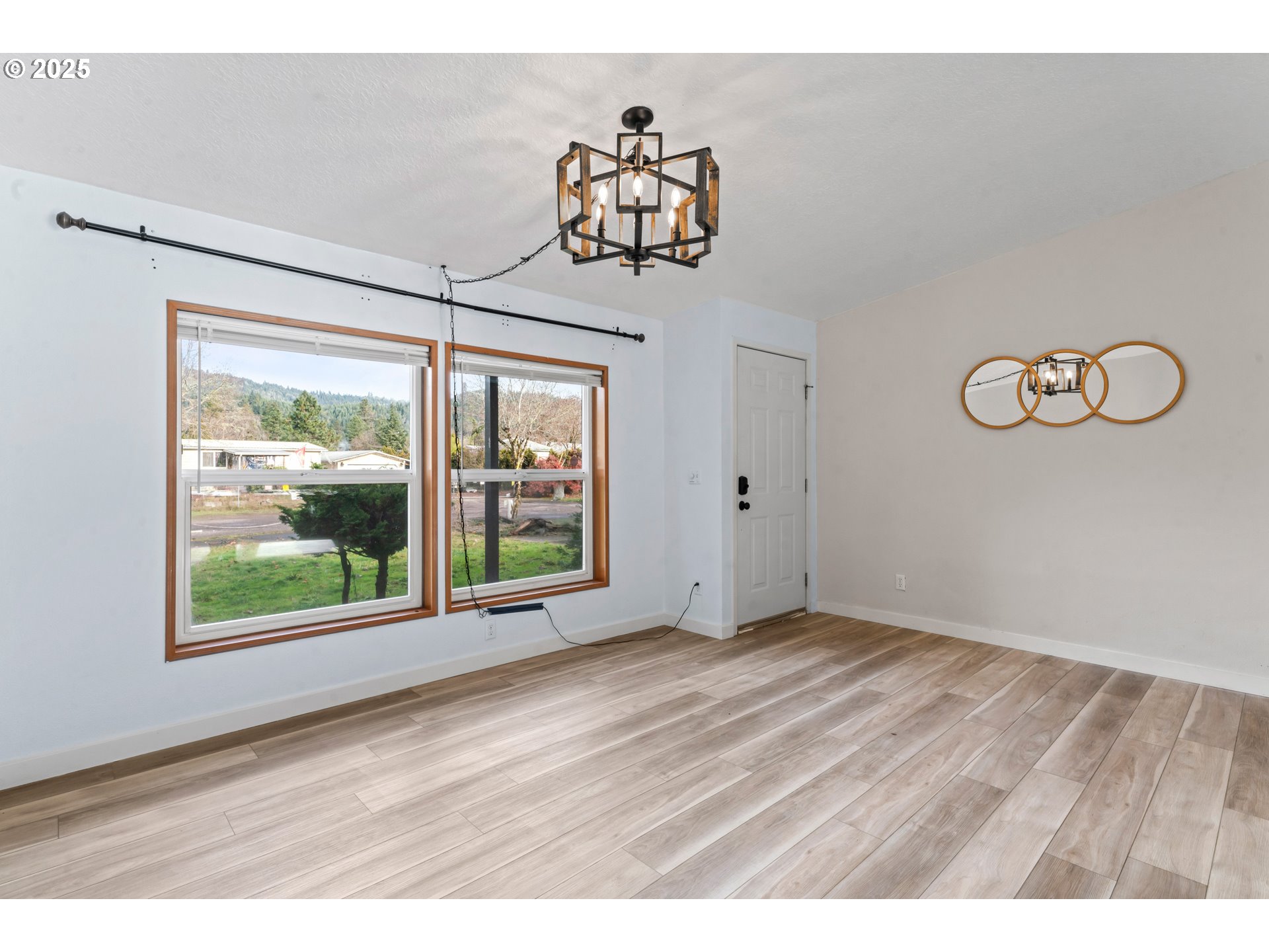 47520 Perkins Street Oakridge, OR 97463 - Photo 13 of 44 a view of room with window and wooden floor