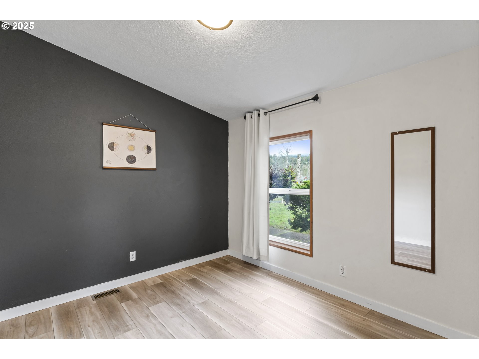 47520 Perkins Street Oakridge, OR 97463 - Photo 28 of 44 a view of an empty room with a window