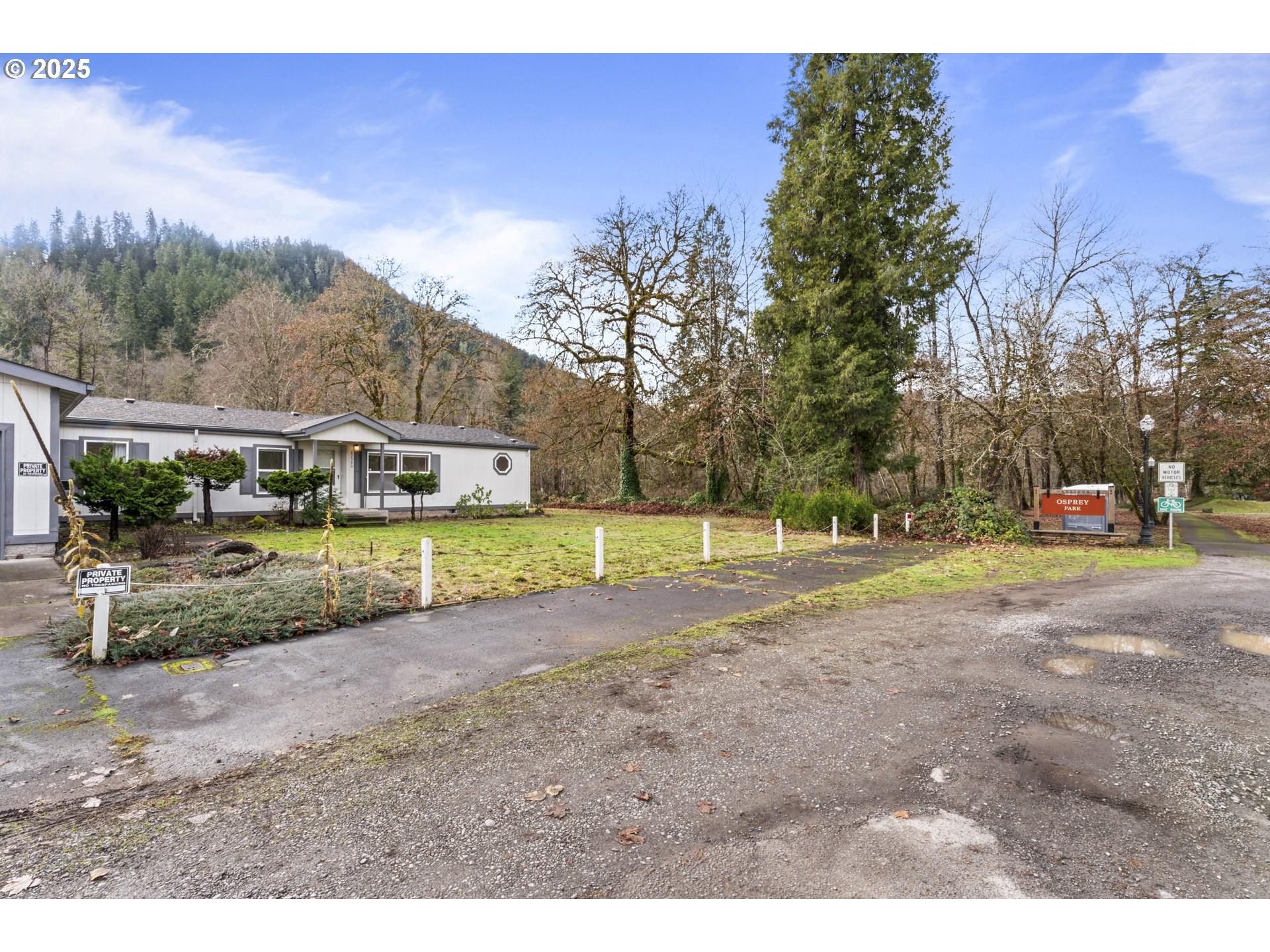 47520 Perkins Street Oakridge, OR 97463 - Photo 34 of 44 a view of a house with a big yard