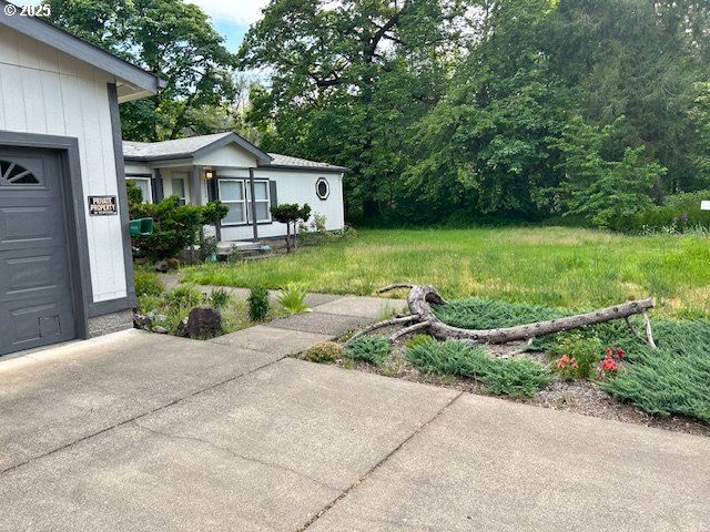 47520 Perkins Street Oakridge, OR 97463 - Photo 36 of 44 a front view of house with yard and green space