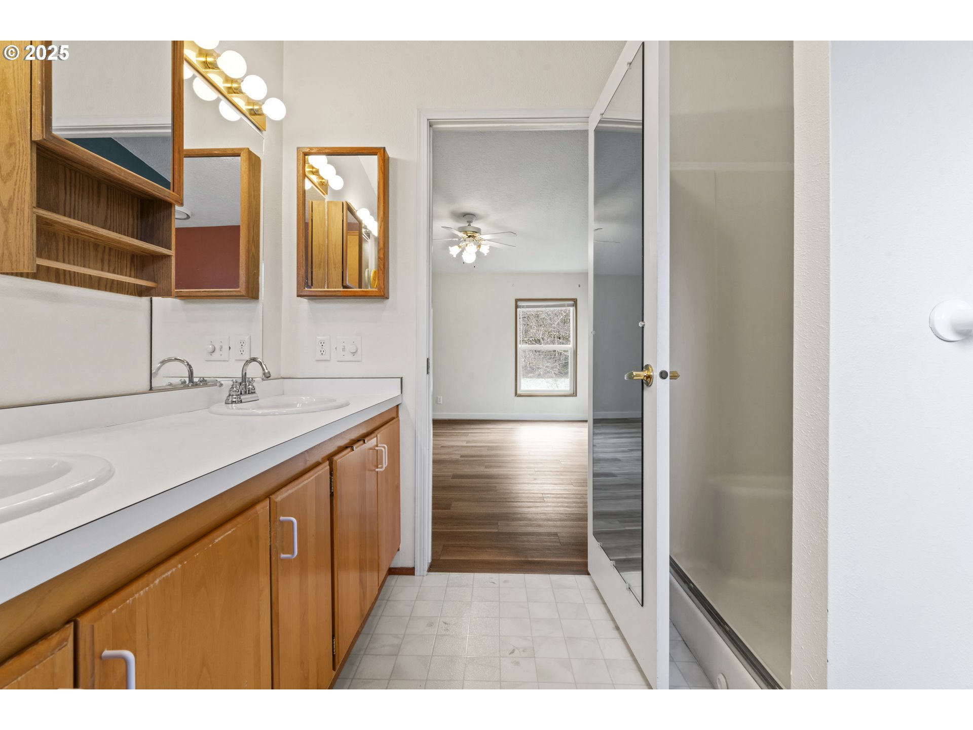 47520 Perkins Street Oakridge, OR 97463 - Photo 10 of 44 a bathroom with a sink a shower and a mirror