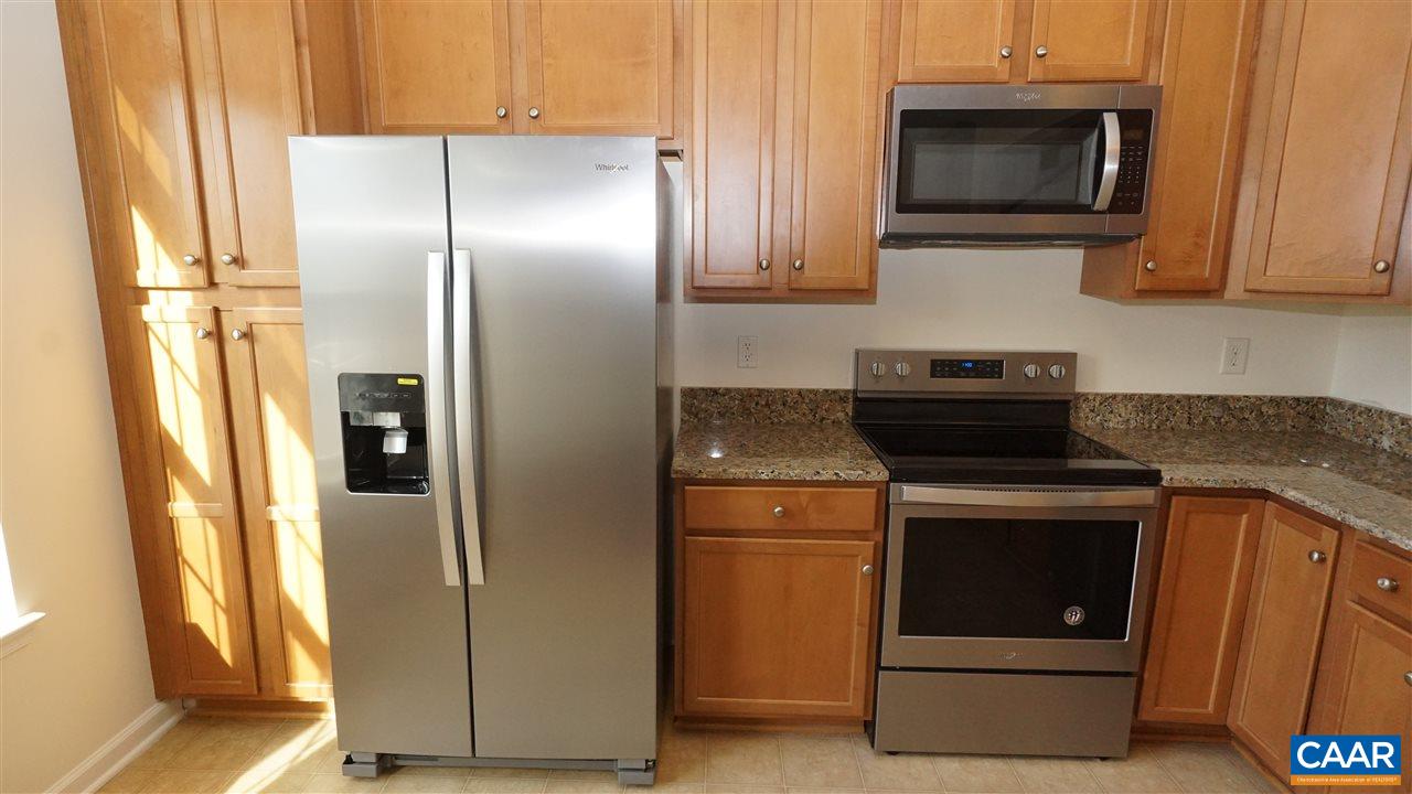 461 Rolkin Road Charlottesville, VA 22911 - Photo 7 of 19 a kitchen with a refrigerator stove and microwave