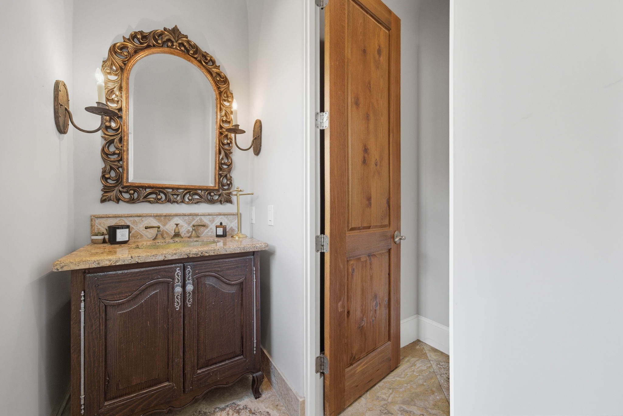 2370 Bolsover Street Houston, TX 77005 - Photo 20 of 46 a view of bathroom with a sink and mirror