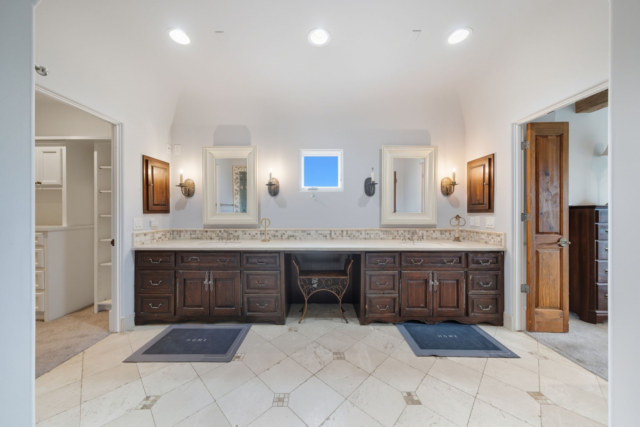 2370 Bolsover Street Houston, TX 77005 - Photo 27 of 46 a large bathroom with a sink and a large mirror