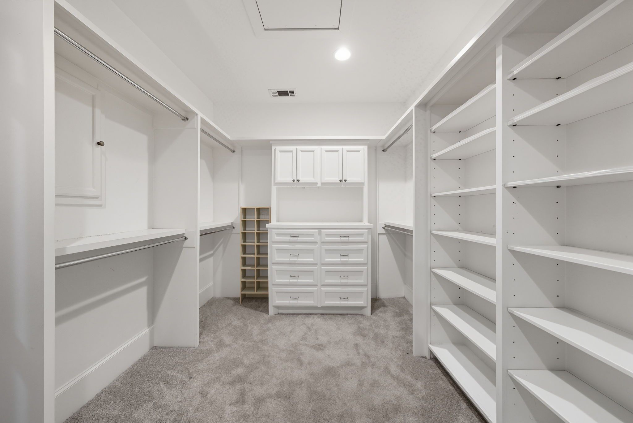 2370 Bolsover Street Houston, TX 77005 - Photo 30 of 46 a view of walk in closet with empty racks