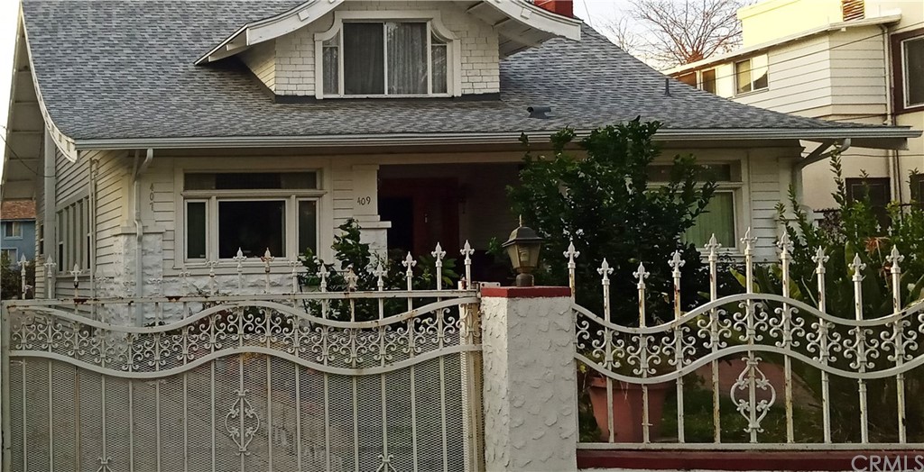 front view of a house with a balcony