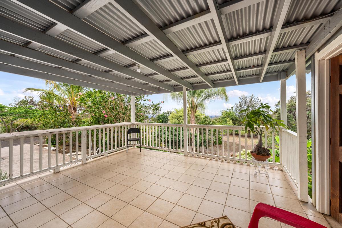 92-8583 Paradise Parkway Ocean View, HI 96704 - Photo 15 of 28 a view of porch with a furniture