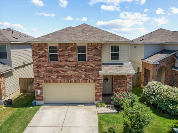 front view of a house with yard
