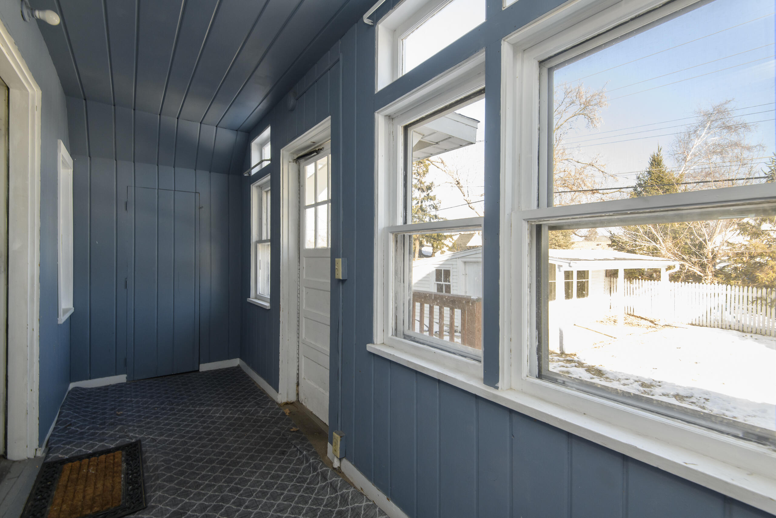 3554 South 84th Street, Unit 3554A Milwaukee, WI 53228 - Photo 11 of 27 Lower unit enclosed porch