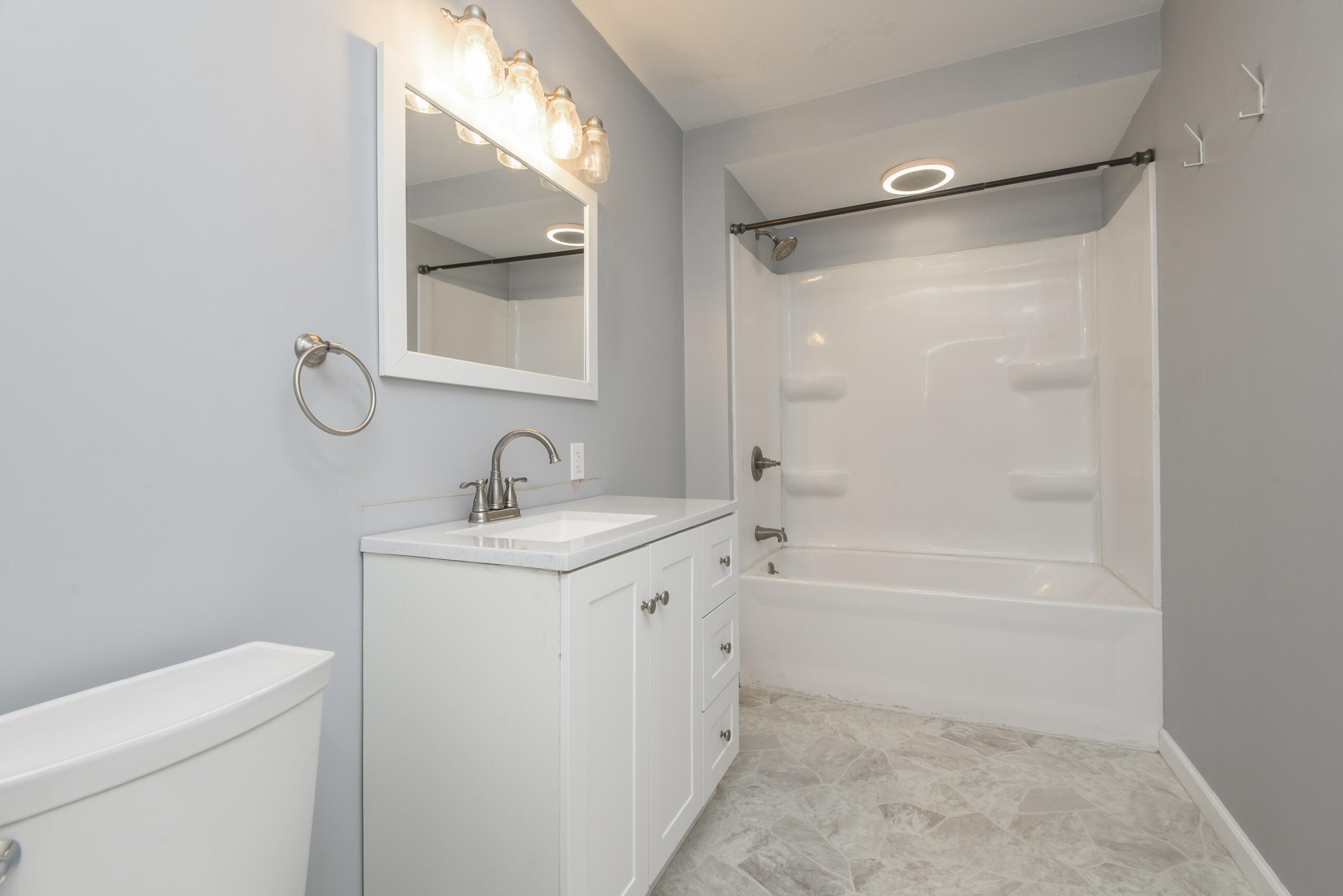 3554 South 84th Street, Unit 3554A Milwaukee, WI 53228 - Photo 6 of 27 Lower unit bathroom
