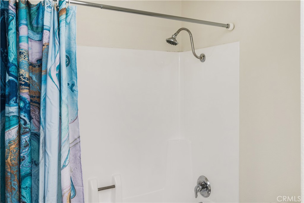 5573 East Vista Del Rio Anaheim, CA 92807 - Photo 28 of 42 a bathroom with a shower