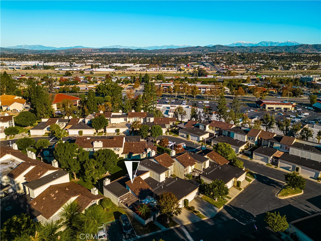 5573 East Vista Del Rio Anaheim, CA 92807 - Photo 33 of 42 an aerial view of residential building with parking space