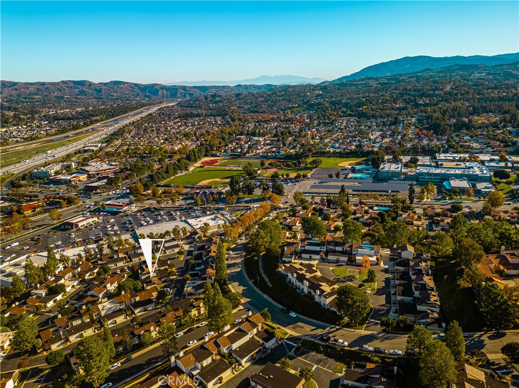 5573 East Vista Del Rio Anaheim, CA 92807 - Photo 38 of 42 an aerial view of residential house and car parked