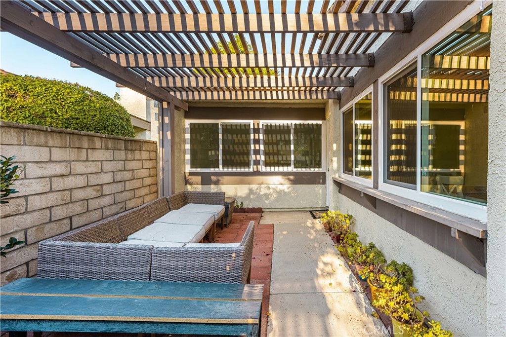 5573 East Vista Del Rio Anaheim, CA 92807 - Photo 4 of 42 a front view of a house with a large window