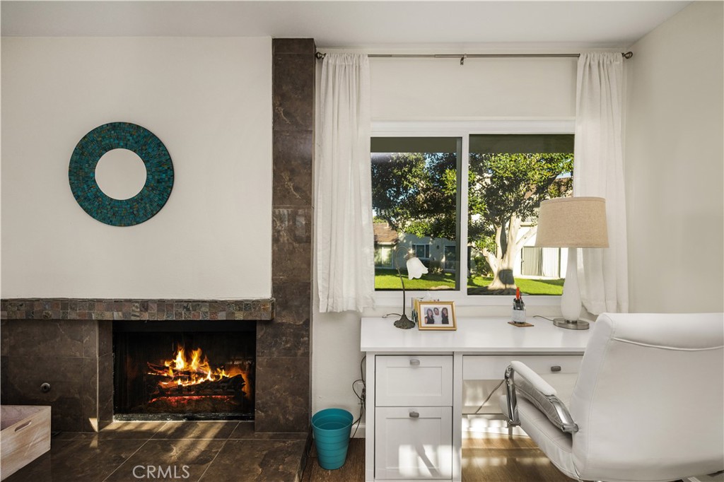 5573 East Vista Del Rio Anaheim, CA 92807 - Photo 8 of 42 a kitchen with a sink and a large window
