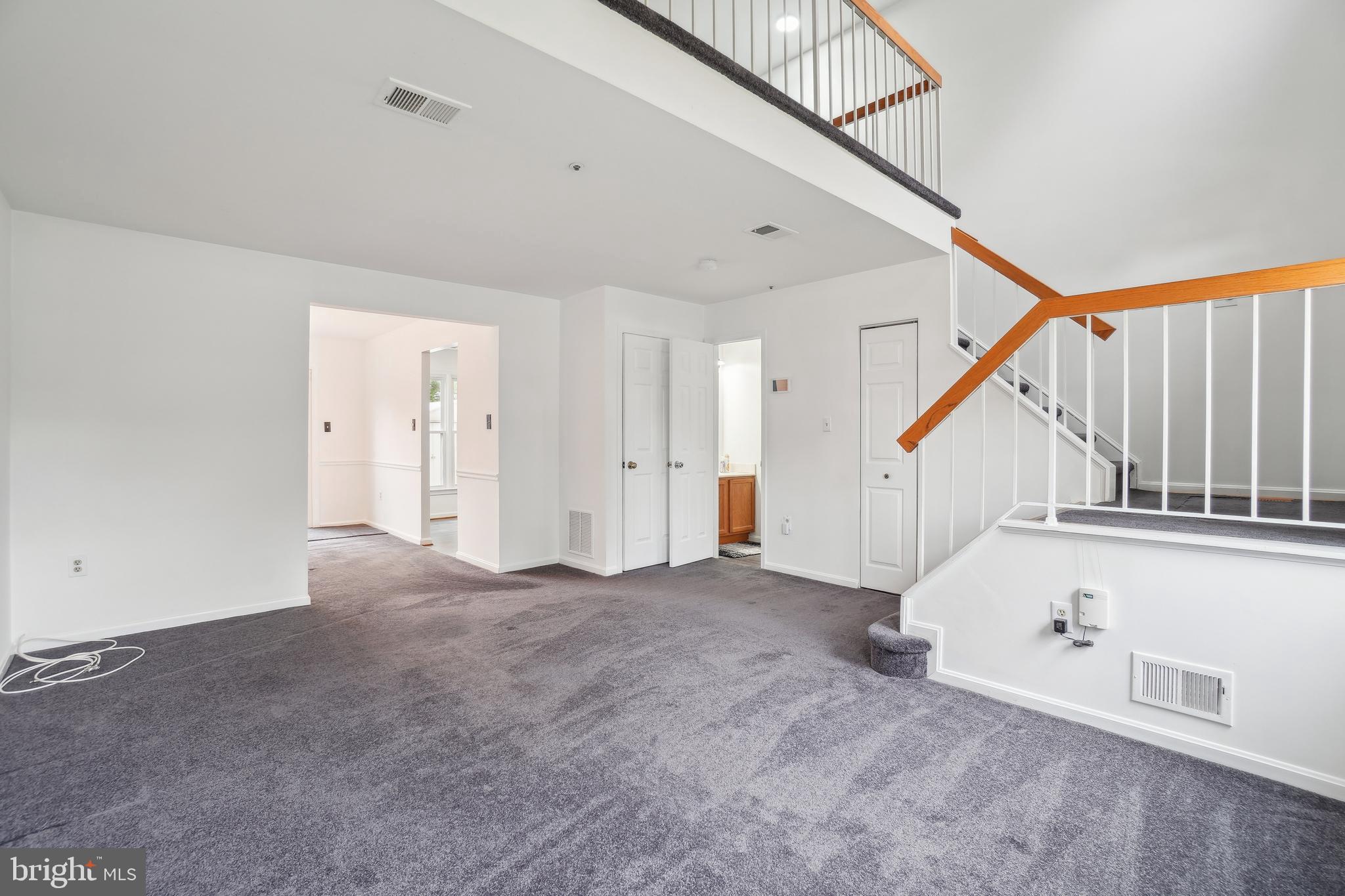3425 Epic Gate Bowie, MD 20716 - Photo 3 of 25 a view of an empty room with stairs