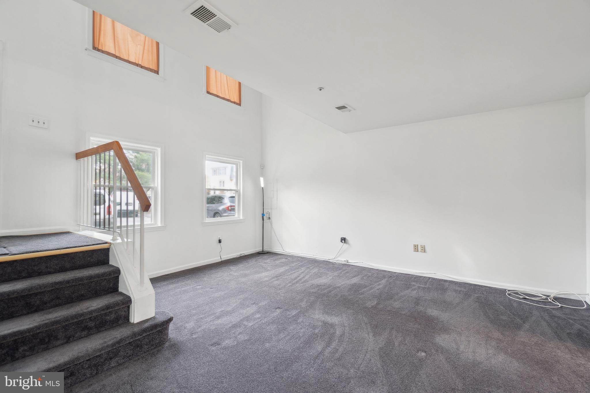 3425 Epic Gate Bowie, MD 20716 - Photo 4 of 25 a view of an empty room with stairs
