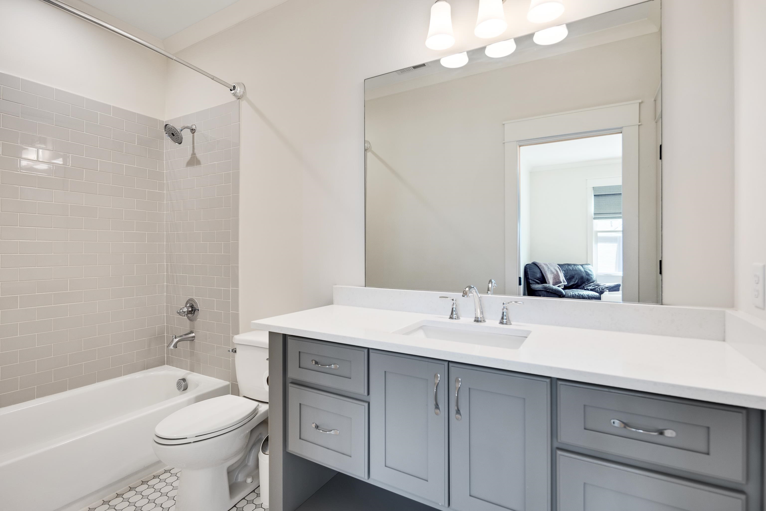 100 Sunflower View Road Piperton, TN 38017 - Photo 27 of 29 Bathroom vanity with a white countertop and undermount sink