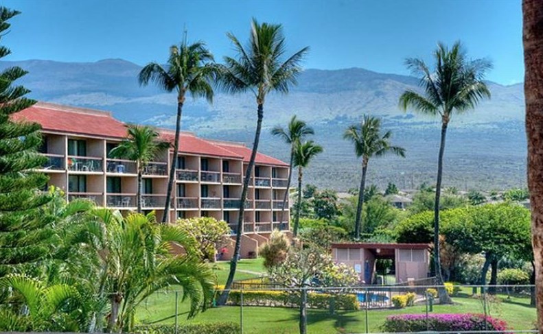 2191 South Kihei Road, Unit 2405 Kihei, HI 96753 - Photo 15 of 17 a view of a house with a yard and potted plants