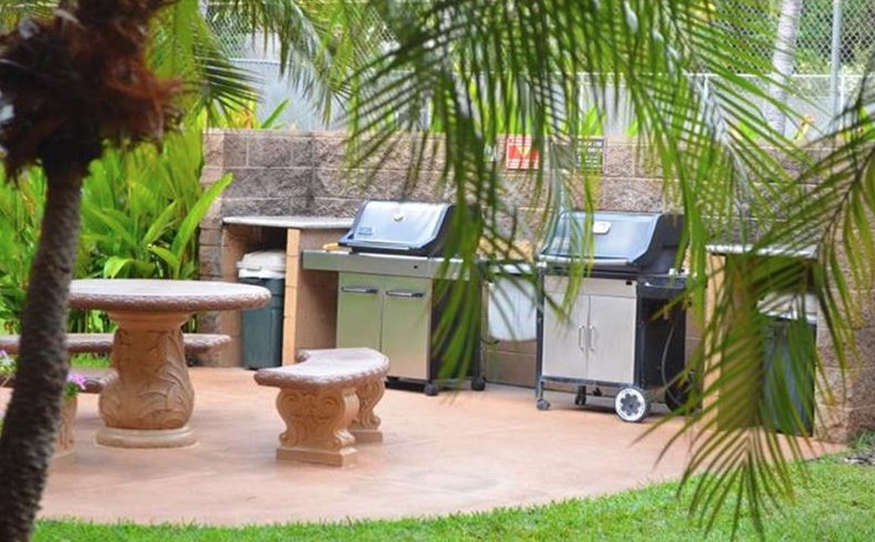 2191 South Kihei Road, Unit 2405 Kihei, HI 96753 - Photo 17 of 17 a view of a fountain with plants in front of house