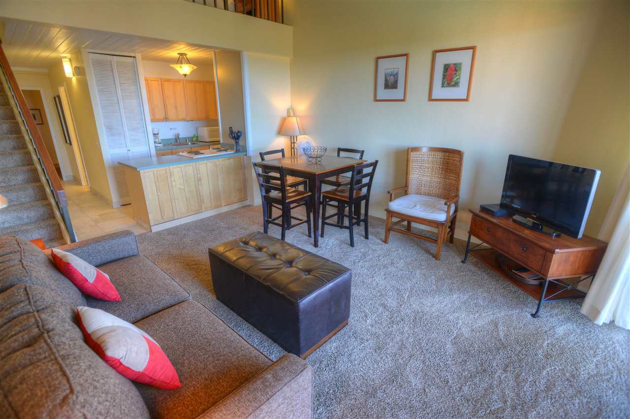 2191 South Kihei Road, Unit 2405 Kihei, HI 96753 - Photo 3 of 17 a living room with furniture and wooden floor