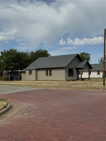 front view of house with a yard