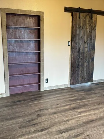 a view of a small space built with hardwood