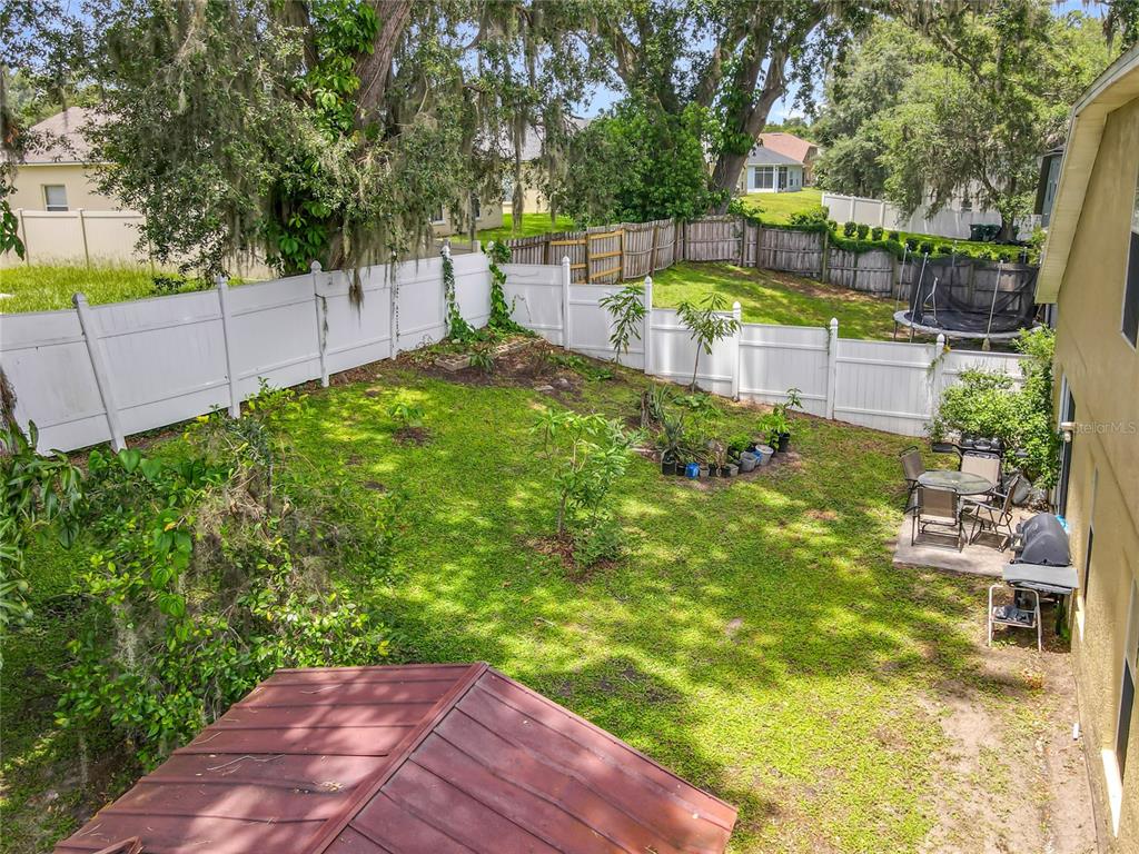 7939 Riffle Lane Orlando, FL 32818 - Photo 44 of 52 a view of a backyard