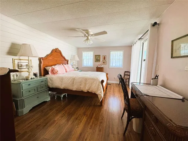 a bathroom with a sink vanity and mirror