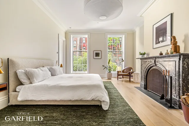 a view of a patio with couple of chairs