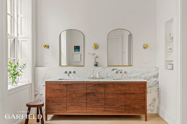 a bedroom with bed and a couch