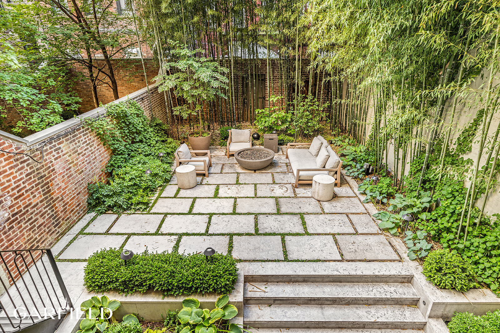 60 West 9th Street Manhattan, NY 10011 - Photo 7 of 22 a view of yard with seating area