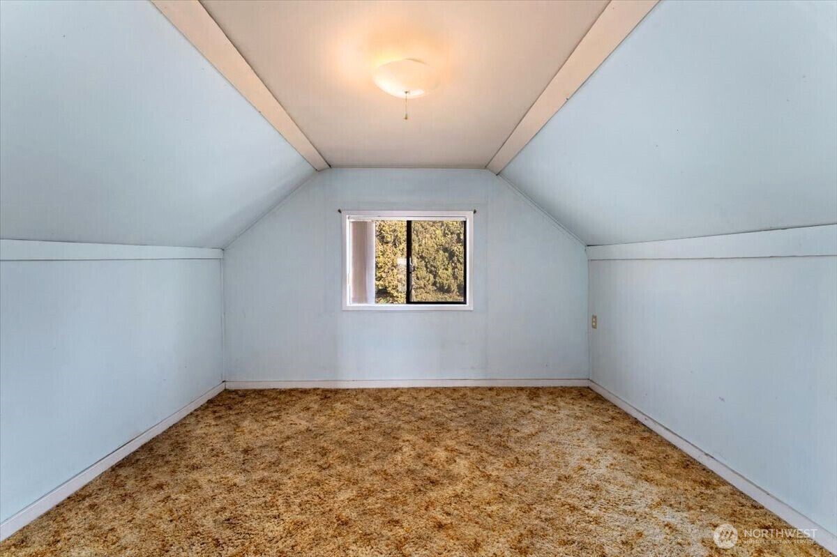 475 Totem Pole Road Manson, WA 98831 - Photo 23 of 33 an empty room with a workbench