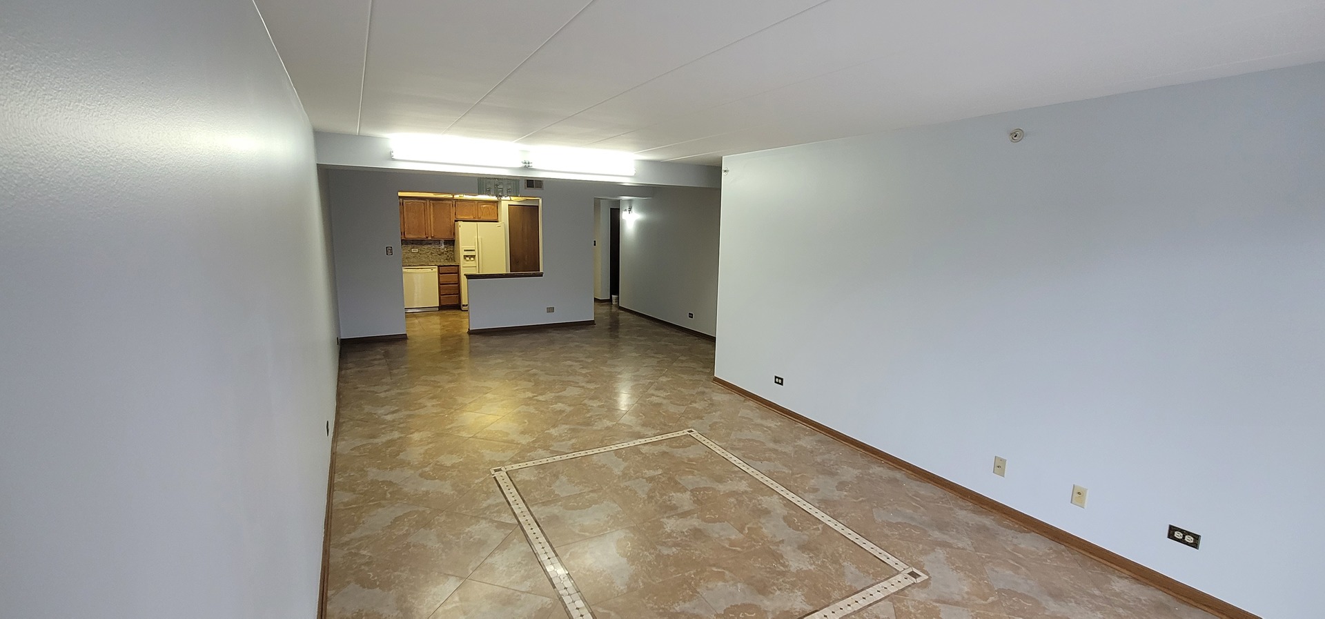 4530 West 93rd Street, Unit 2B Oak Lawn, IL 60453 - Photo 7 of 22 a view of a livingroom with a staircase