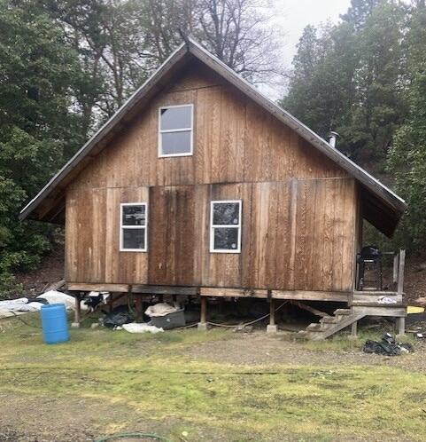395 East Van Duzen Road Bridgeville, CA 95526 - Photo 8 of 19 a front view of a house with swimming pool