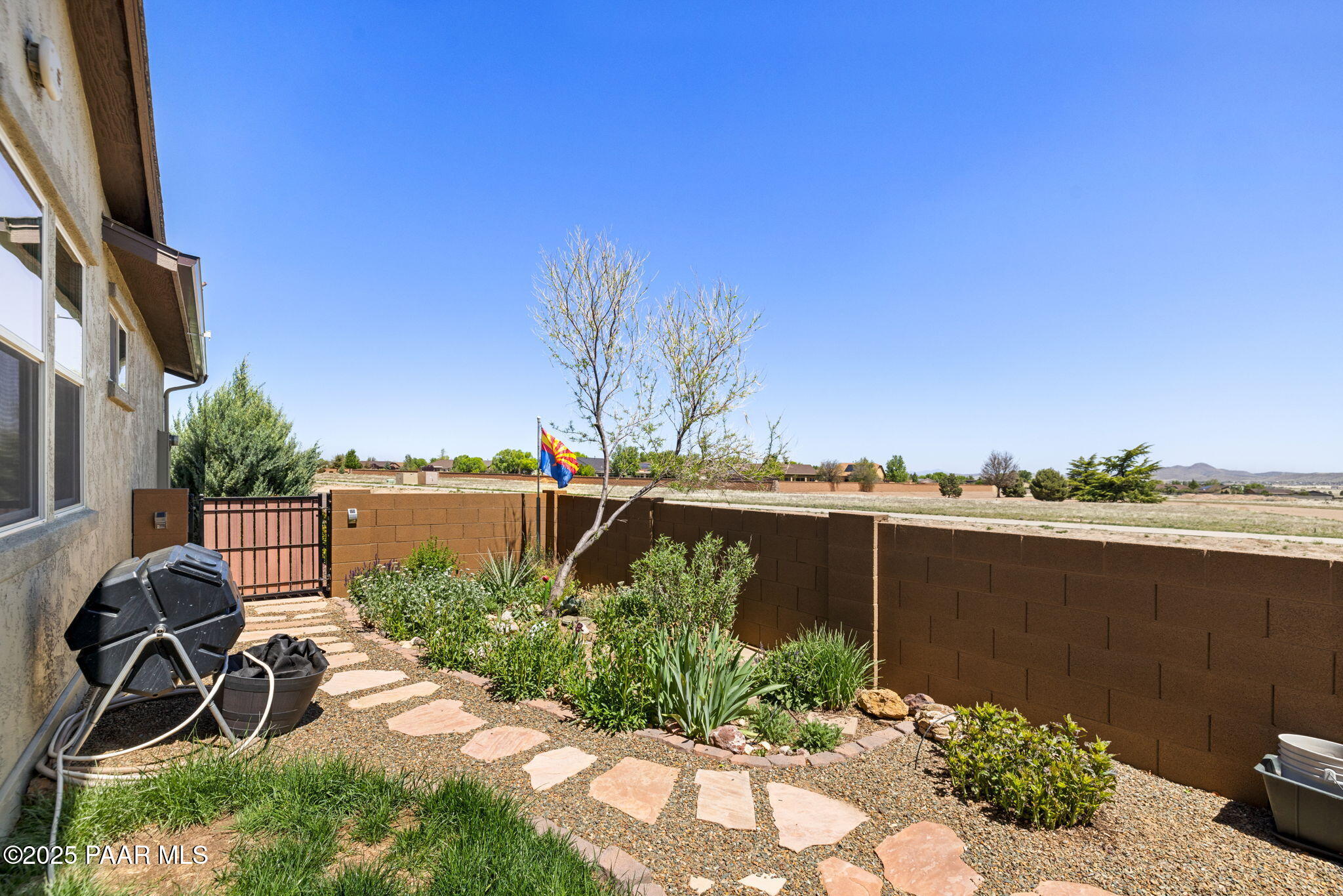 7794 Lavender Loop Prescott Valley, AZ 86315 - Photo 28 of 57 a view of a lake with a yard