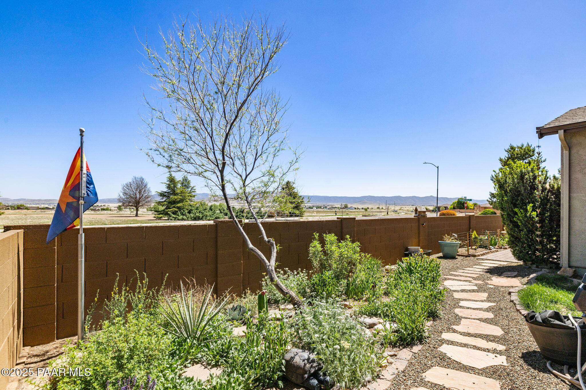 7794 Lavender Loop Prescott Valley, AZ 86315 - Photo 29 of 57 a view of a pathway with a yard