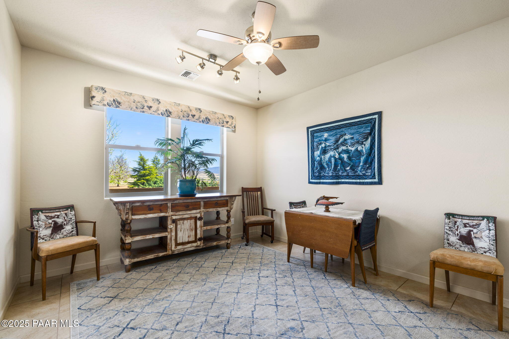 7794 Lavender Loop Prescott Valley, AZ 86315 - Photo 5 of 57 a living room with furniture and a large window