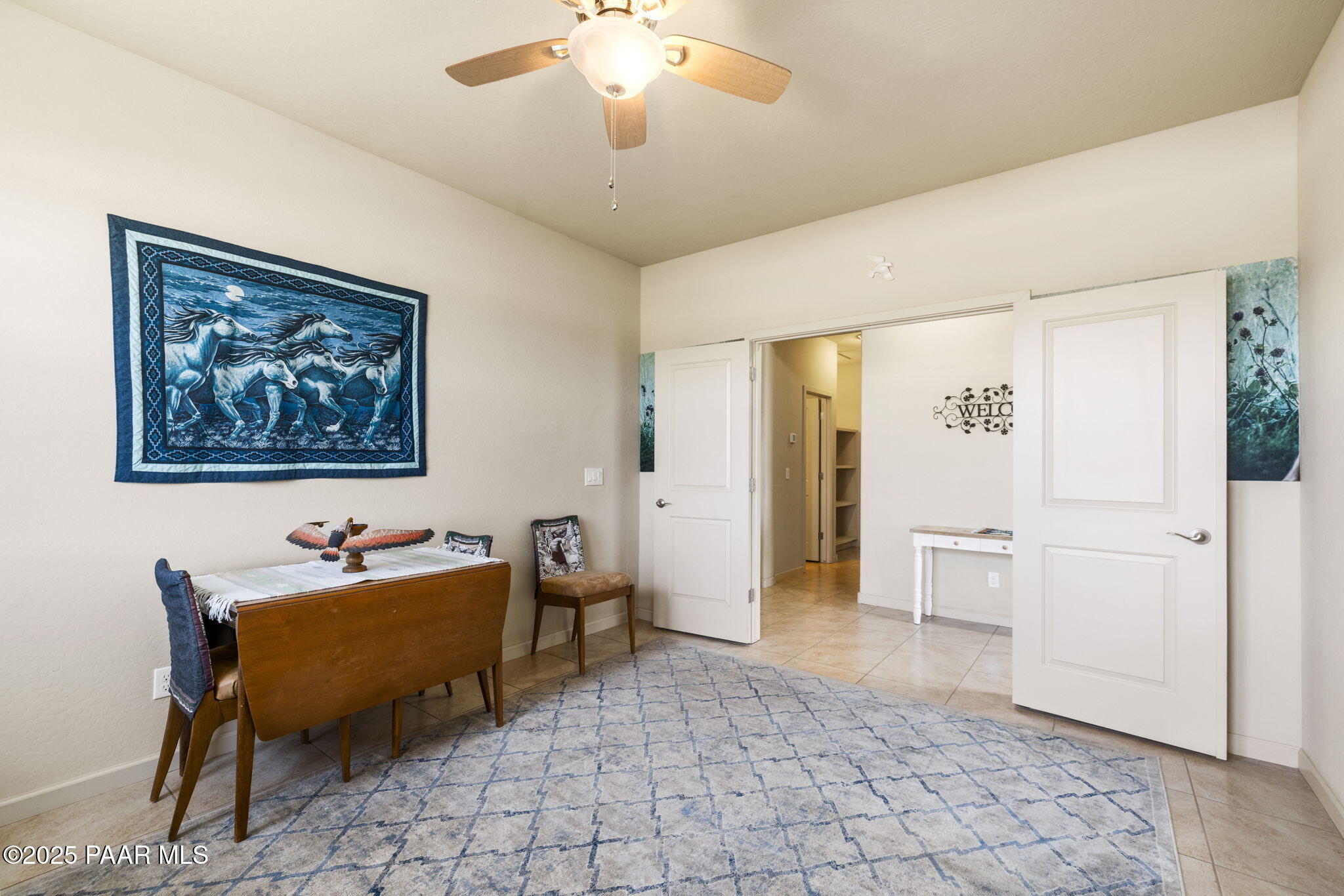7794 Lavender Loop Prescott Valley, AZ 86315 - Photo 6 of 57 a living room with furniture and a table