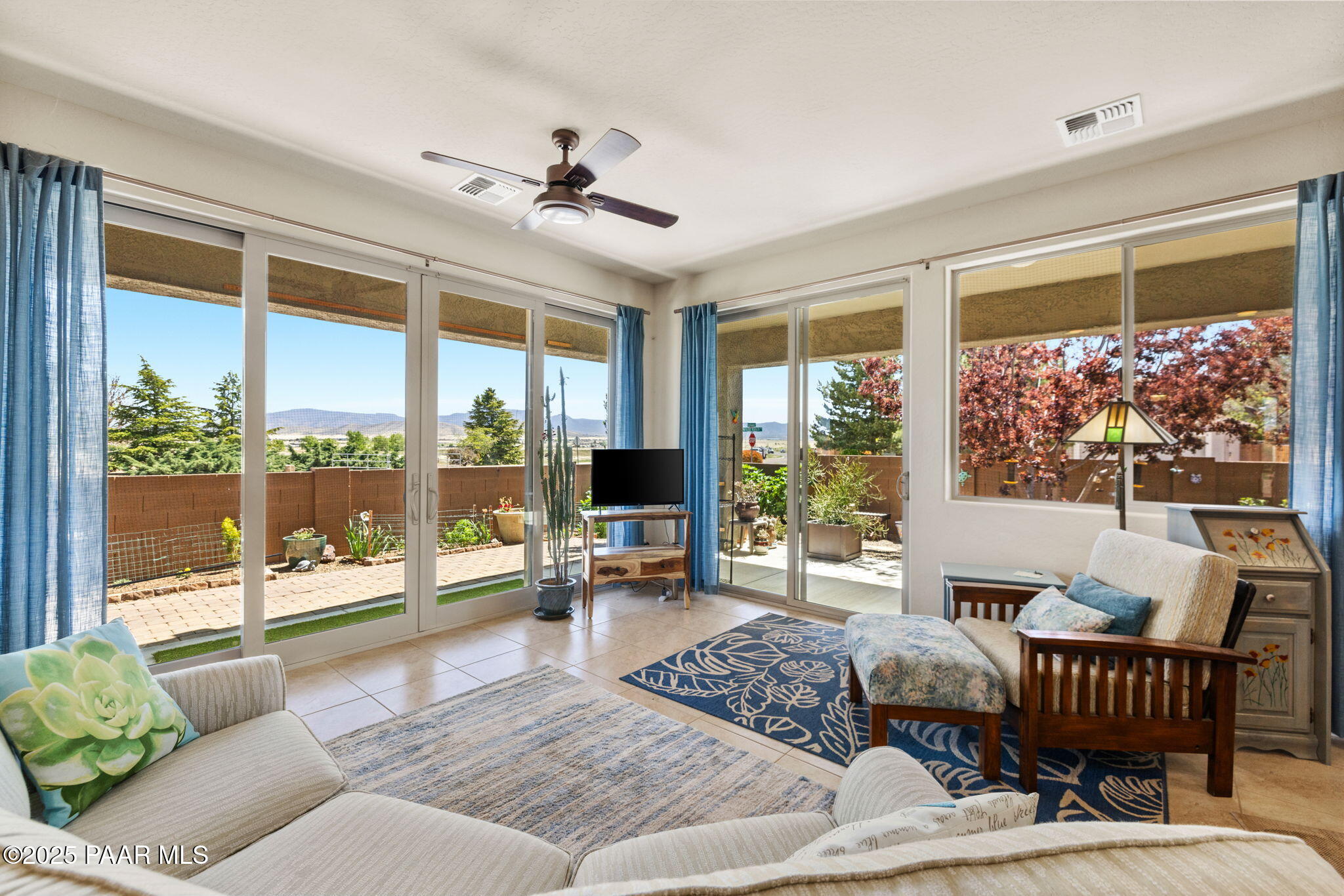7794 Lavender Loop Prescott Valley, AZ 86315 - Photo 7 of 57 a living room with furniture and a large window