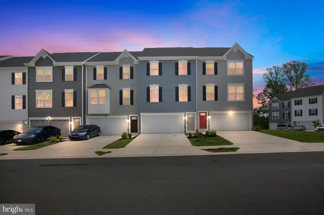 a buildings view with a street
