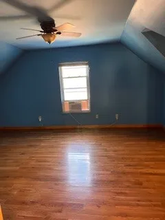 a bathroom with a sink a toilet a mirror and shower