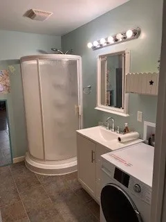a bathroom with a sink and a mirror