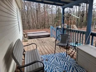 a large body of water with a tree in the background
